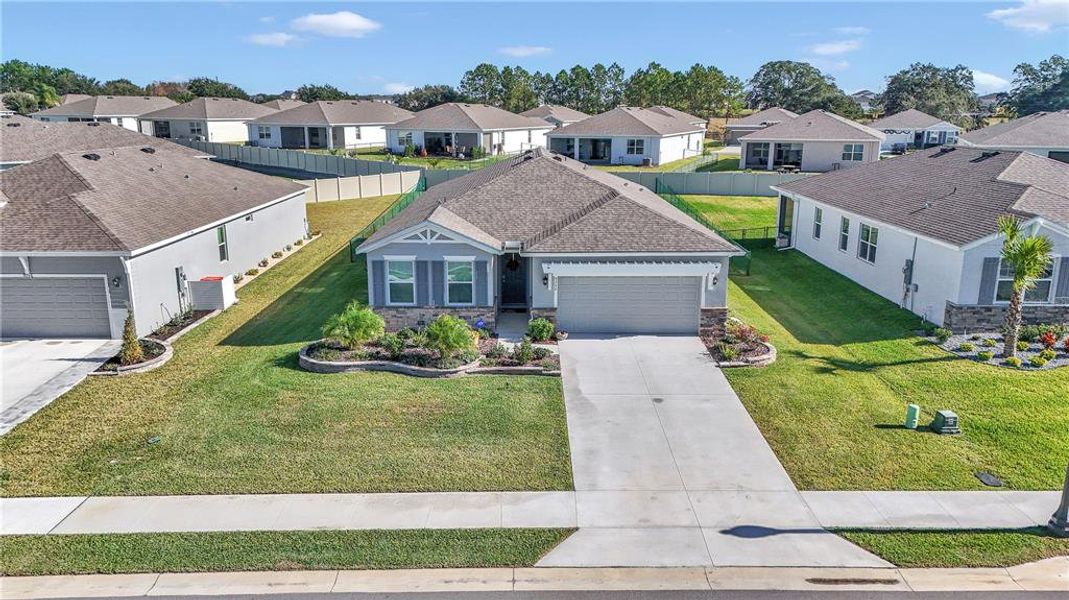 Front exterior of a new home in JB Ranch, Ocala, FL, highlighting curb appeal (Image 2). Front exterior of a new home in JB Ranch, Ocala, FL, highlighting curb appeal (Image 2).