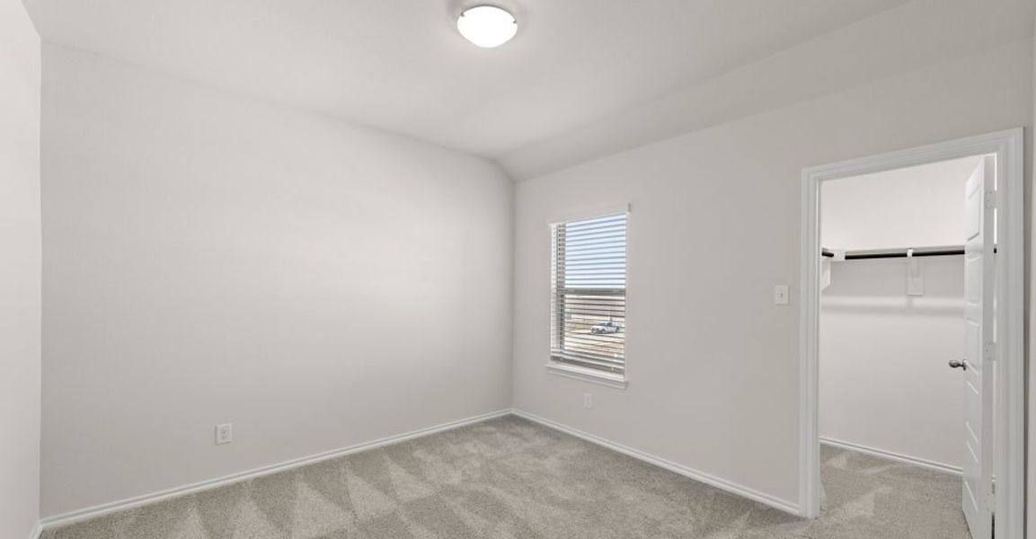 Representative exterior photo of a completed home built from the Caddo by Impression Homes in Creekshaw, Royse City, TX (Image 15).