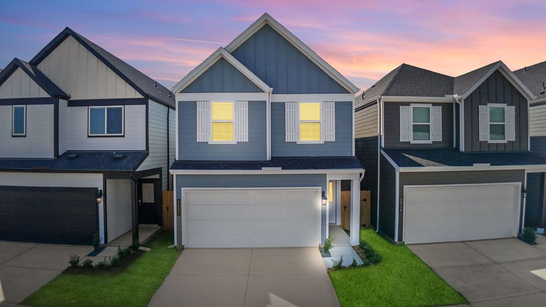 Front exterior of a new home in Villarosa at Tamarron, Katy, TX, highlighting curb appeal (Image 1). Front exterior of a new home in Villarosa at Tamarron, Katy, TX, highlighting curb appeal (Image 1).