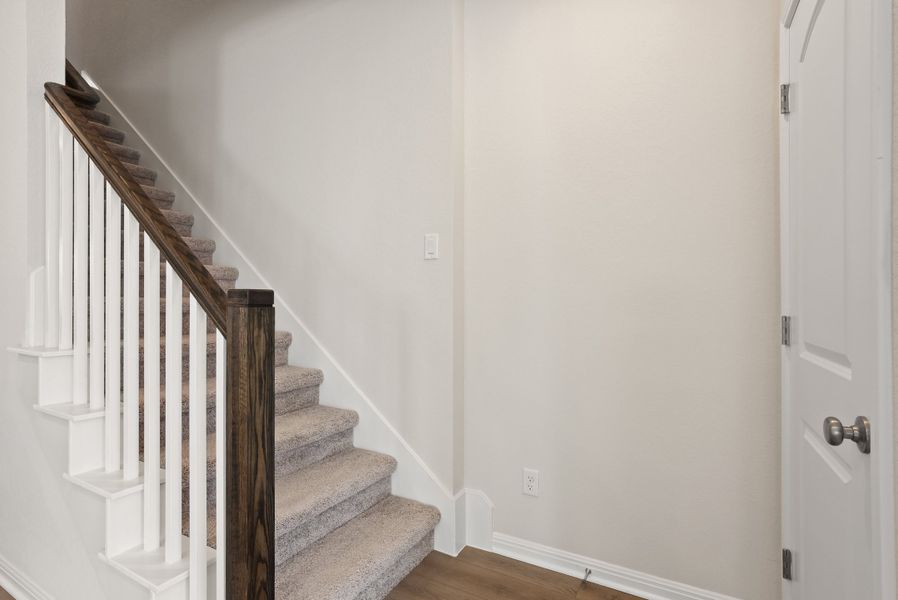 Representative unfurnished interior of a home built from the Somerville by Ashton Woods in Willow Springs, Buda (Image 35).
