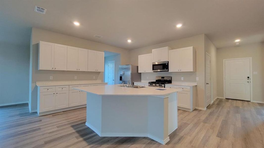 Kitchen- All Home and community information, including pricing, included features, terms, availability and amenities, are subject to change at any time without notice or obligation. All Drawings, pictures, photographs, video, square footages, floor plans, elevations, features, colors and sizes are approximate for illustration purposes only and will vary from the homes as built. Kitchen- All Home and community information, including pricing, included features, terms, availability and amenities, are subject to change at any time without notice or obligation. All Drawings, pictures, photographs, video, square footages, floor plans, elevations, features, colors and sizes are approximate for illustration purposes only and will vary from the homes as built.