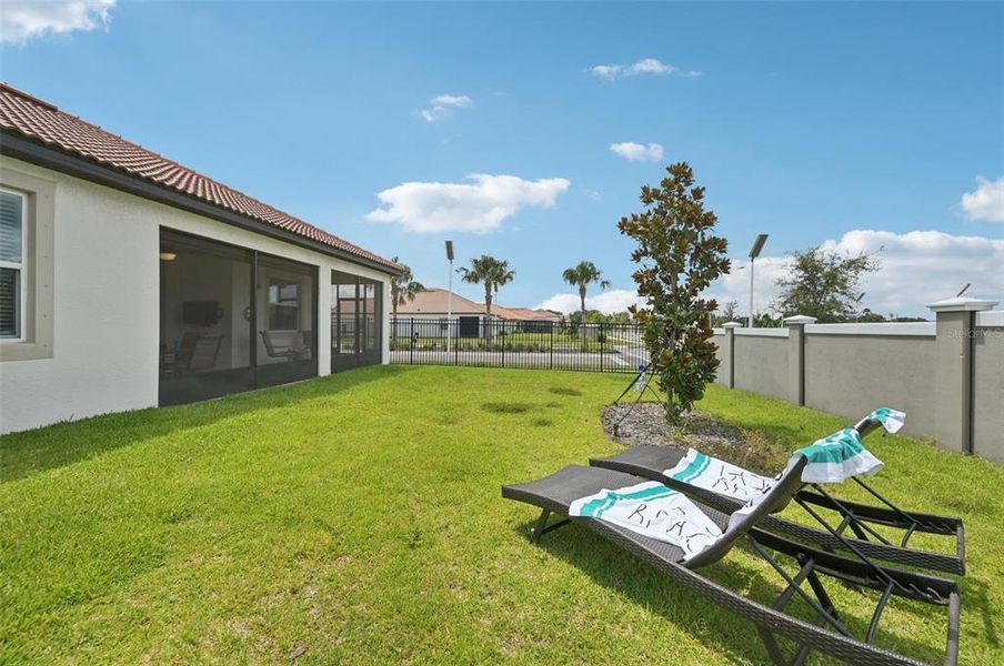 Front exterior of a new home in , Wimauma, FL, highlighting curb appeal (Image 27). Front exterior of a new home in , Wimauma, FL, highlighting curb appeal (Image 27).