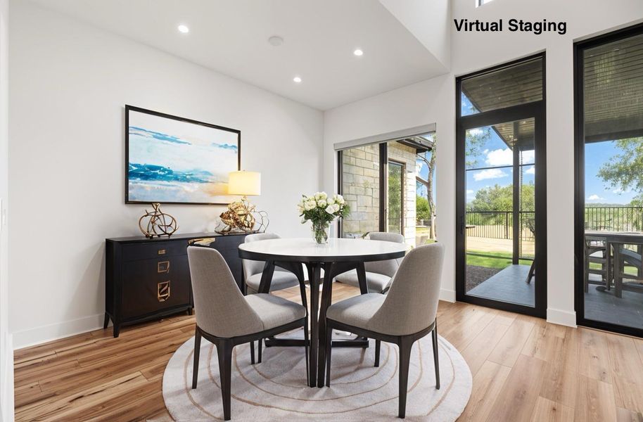 Virtually staged dining area next to back patio and great room Virtually staged dining area next to back patio and great room