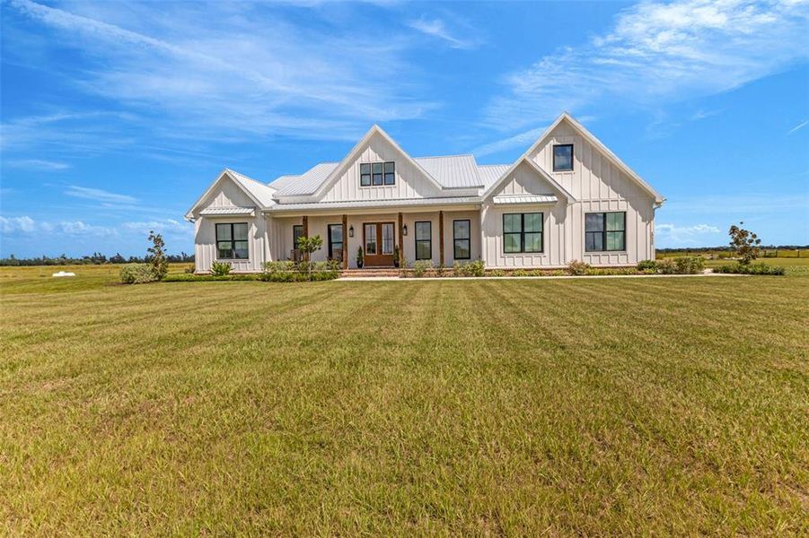 Front exterior of a new home in , Arcadia, FL, highlighting curb appeal (Image 21).