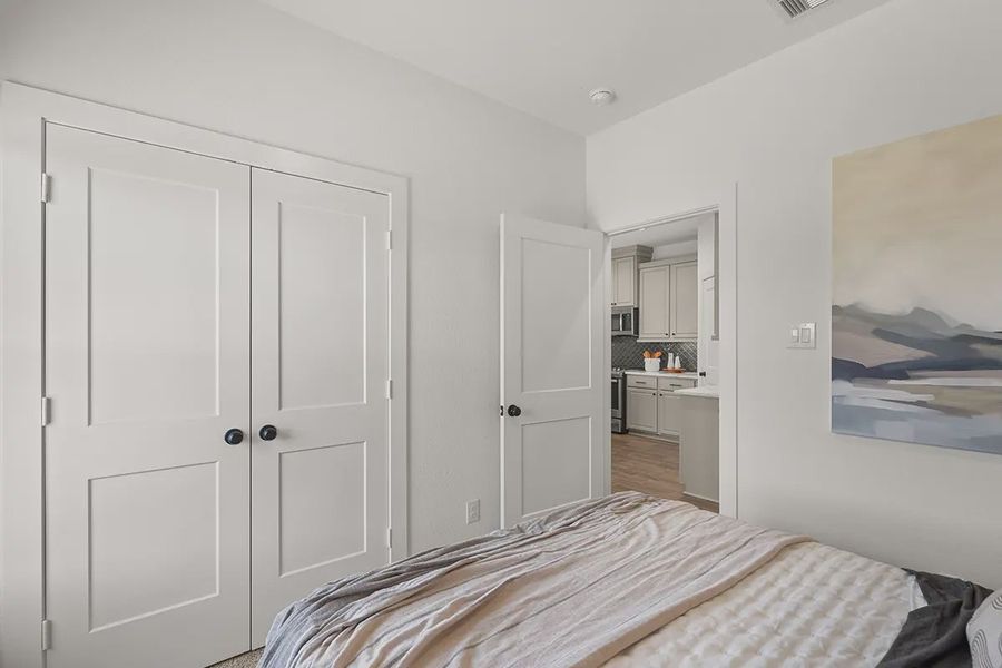 Representative furnished interior of a home built from the Countryside by Chesmar Homes in Meridiana Townhomes, Iowa Colony (Image 15).