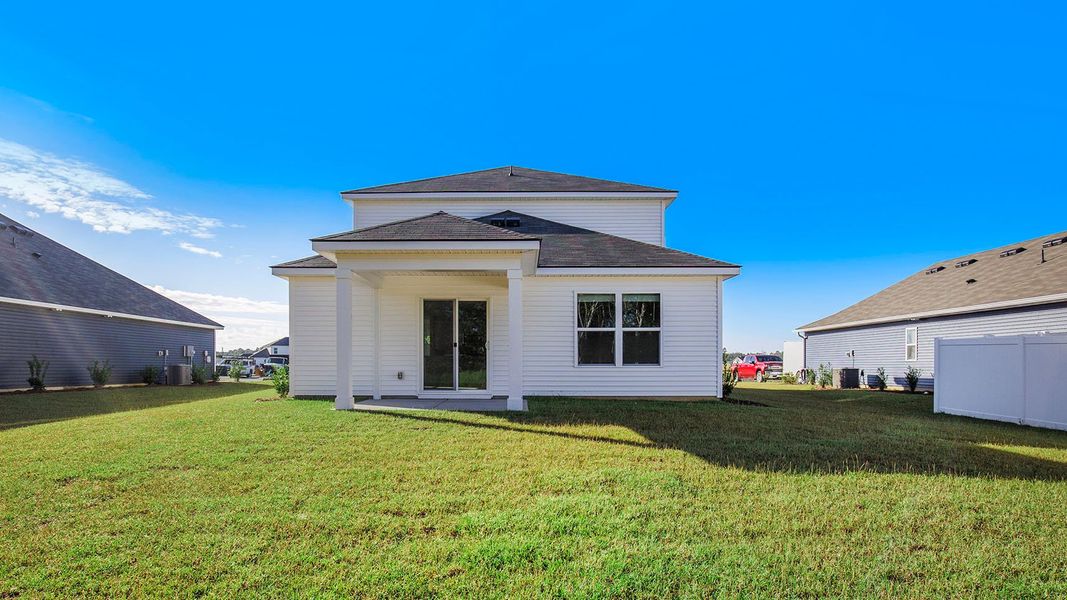 Exterior details and patio area of a home in Dove Crossing, Conway (Image 3).