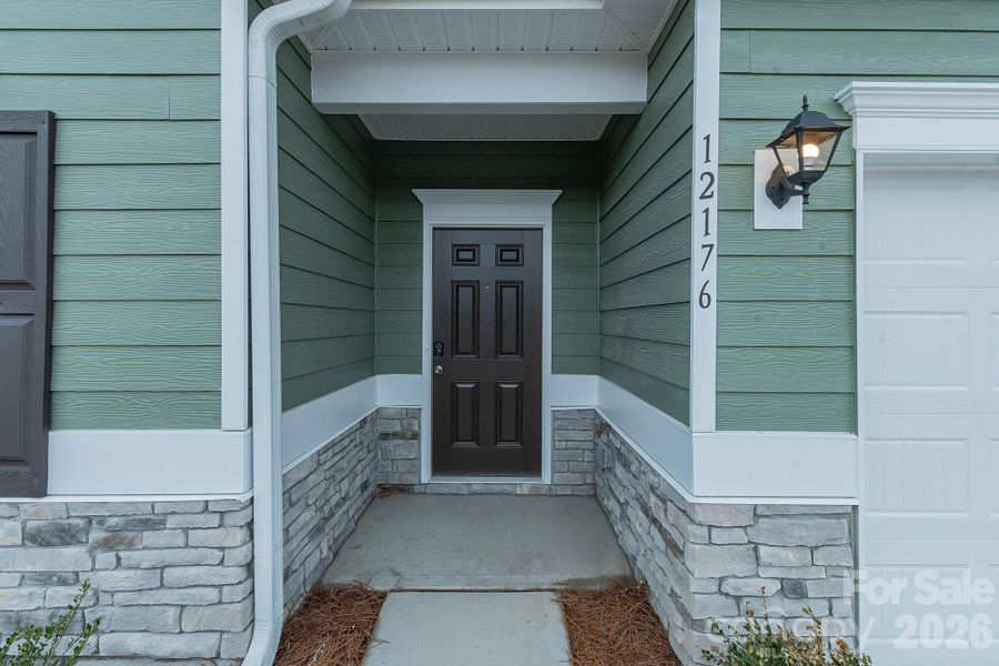 Exterior details and patio area of a home in Pine Bluff, Midland (Image 20). Exterior details and patio area of a home in Pine Bluff, Midland (Image 20).