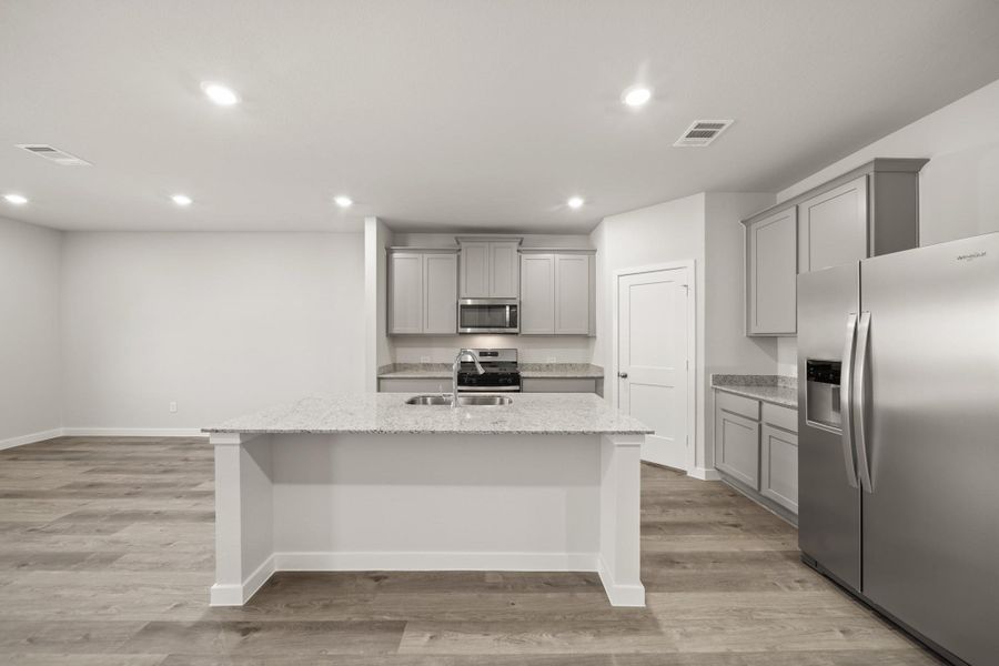Furnished interior view inside a new home in Lexington Heights, Willis (Image 9).