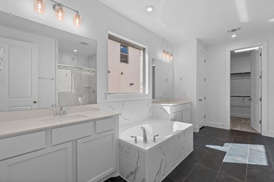 Primary Bath retreat with dual vanities & garden tub Primary Bath retreat with dual vanities & garden tub
