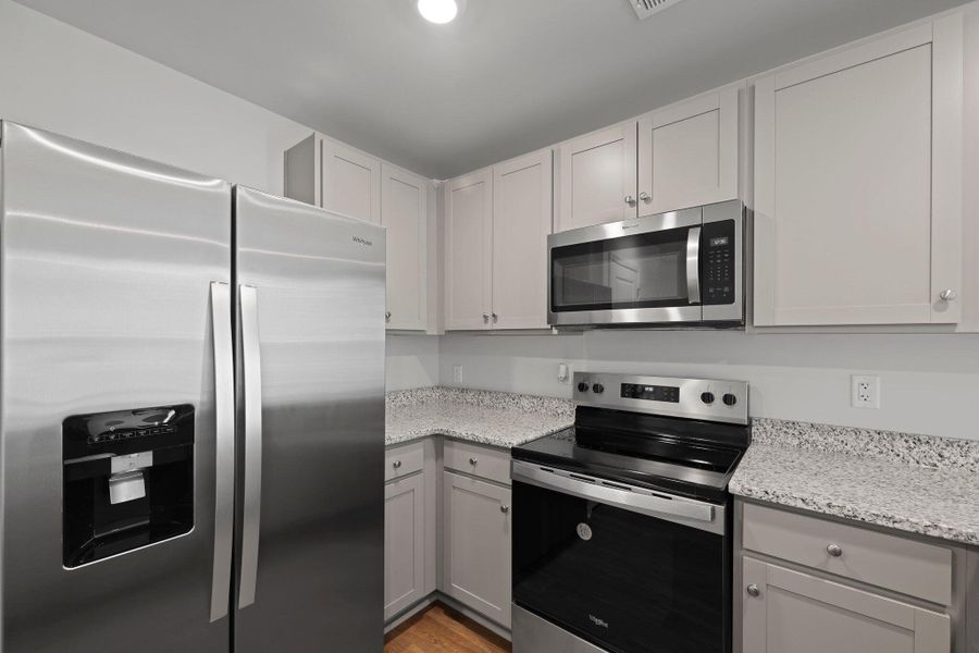 Furnished interior view inside a new home in Pine Hills at Cane Bay, Summerville (Image 7).