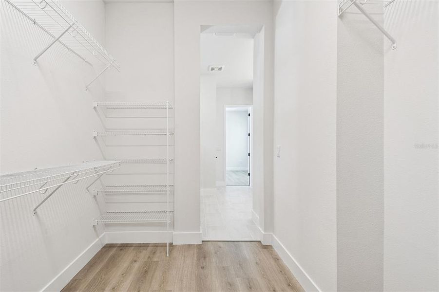 Spacious, unfurnished interior of a new home in Emerald Landing at Waterside at Lakewood Ranch – Cottage Series, Sarasota (Image 29).
