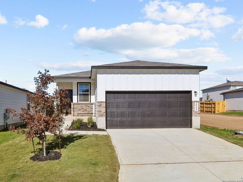 Front exterior of a new home in Applewhite Meadows, San Antonio, TX, highlighting curb appeal (Image 20).