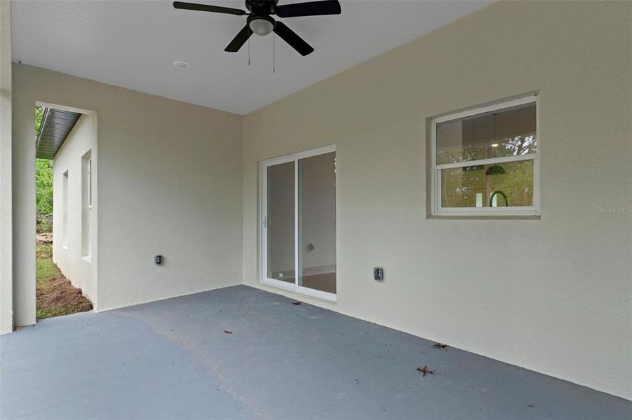 Exterior details and patio area of a home in , Citrus Springs (Image 20).
