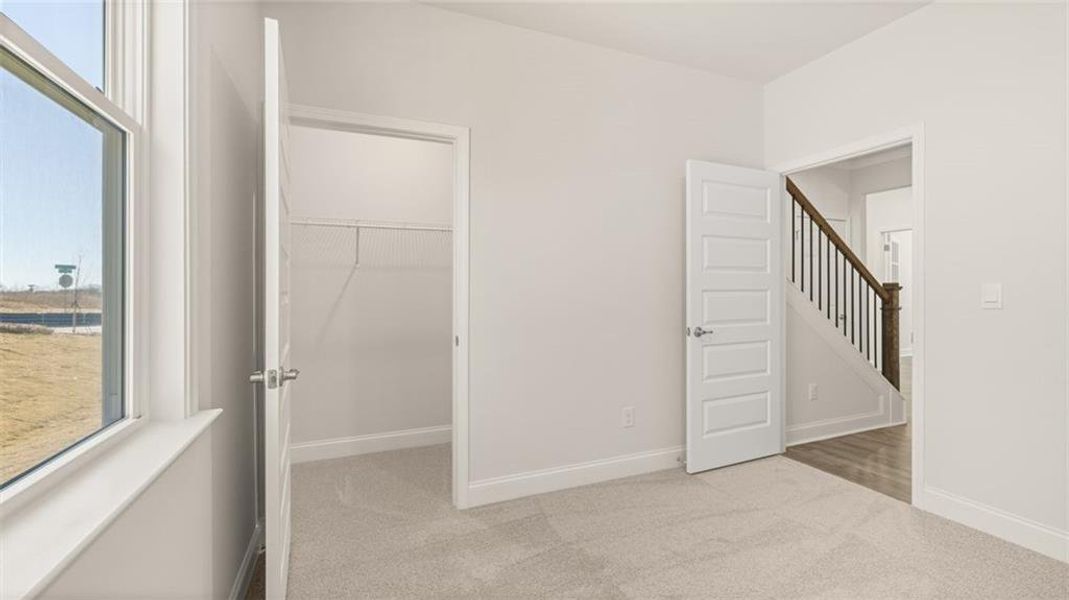 Spacious, unfurnished interior of a new home in Oak Ridge Meadows - Active Adult, Locust Grove (Image 37).