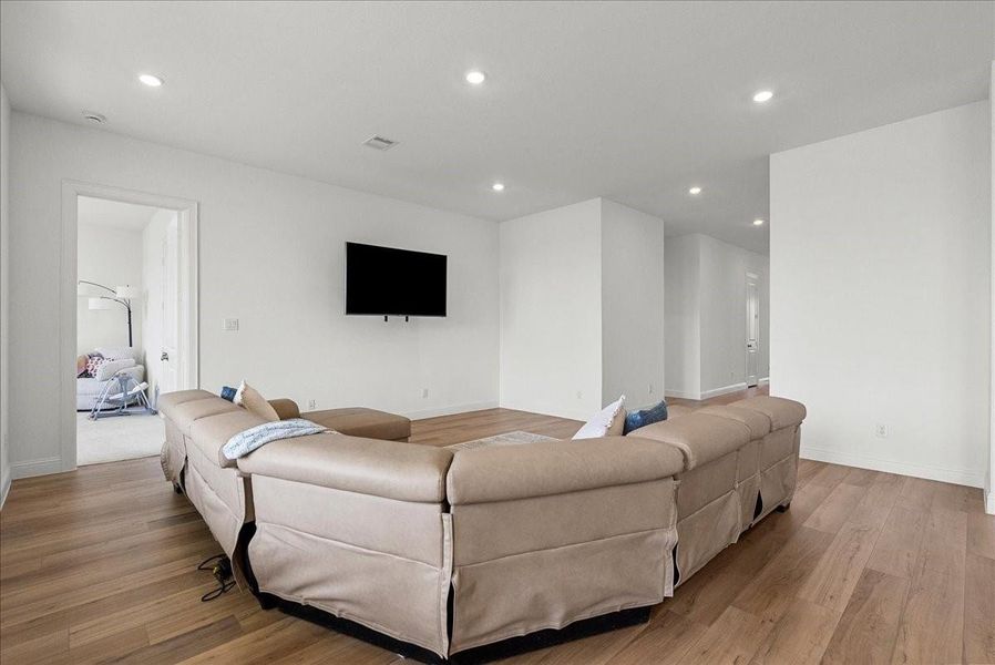 Spacious living room open to the kitchen for easy everyday living and gatherings. Spacious living room open to the kitchen for easy everyday living and gatherings.