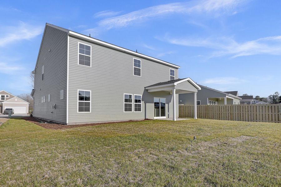 Exterior details and patio area of a home in Citadel Point at Southbridge, Sneads Ferry (Image 4).
