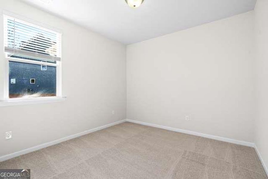 Spacious, unfurnished interior of a new home in Wehunt Meadows, Hoschton (Image 24).