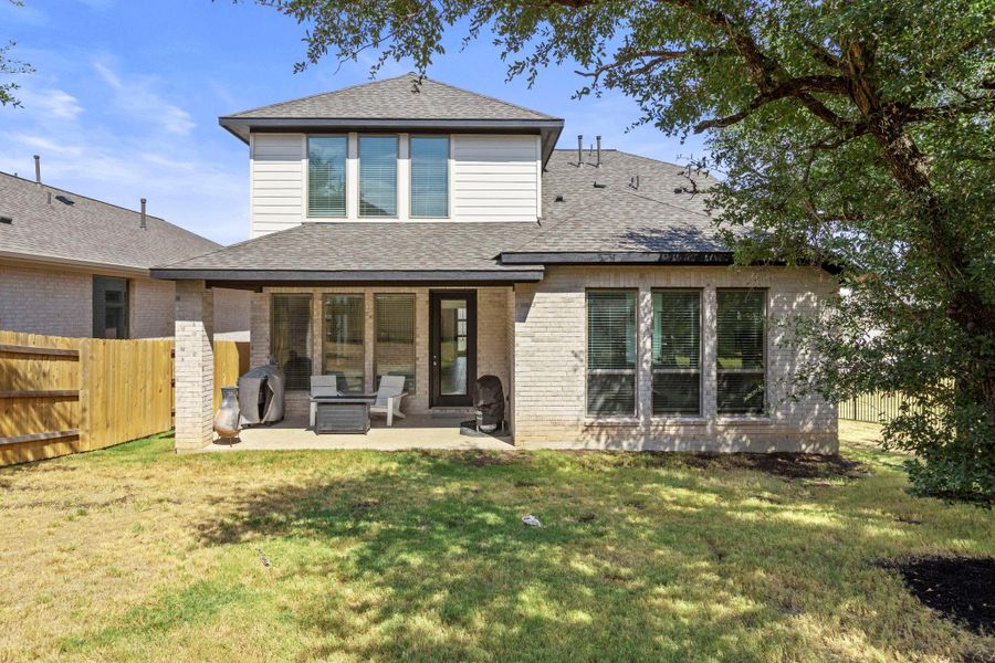 Exterior details and patio area of a home in Parkside on the River, Georgetown (Image 4).
