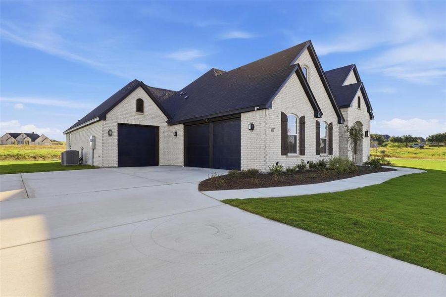 Front exterior of a new home in Aledo Heights - Aledo ISD, Aledo, TX, highlighting curb appeal (Image 2).