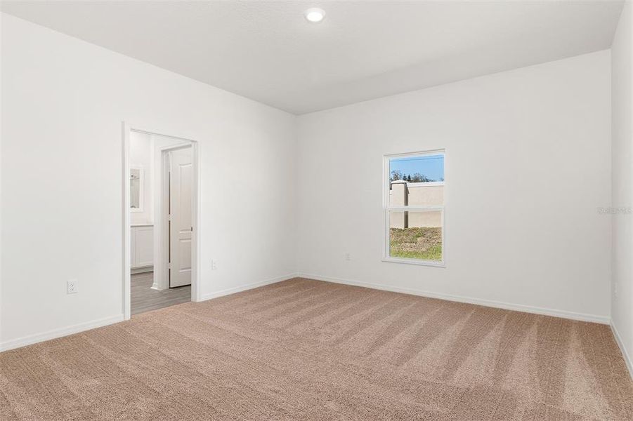 Spacious, unfurnished interior of a new home in Peach Crossings, Winter Haven (Image 17).