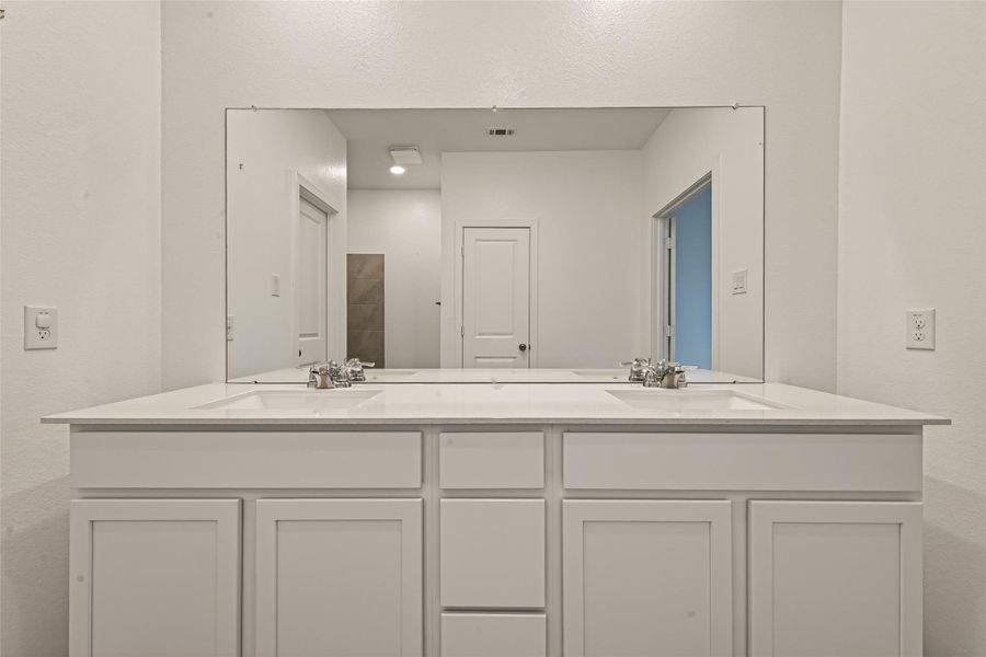 Furnished interior view inside a new home in Sunterra, Katy (Image 6).