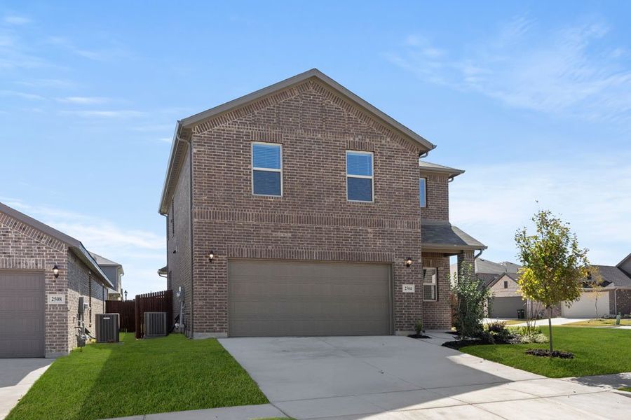 Representative exterior photo of a completed home built from the Mulberry by Impression Homes in Keeneland, Aubrey, TX (Image 2). Representative exterior photo of a completed home built from the Mulberry by Impression Homes in Keeneland, Aubrey, TX (Image 2).