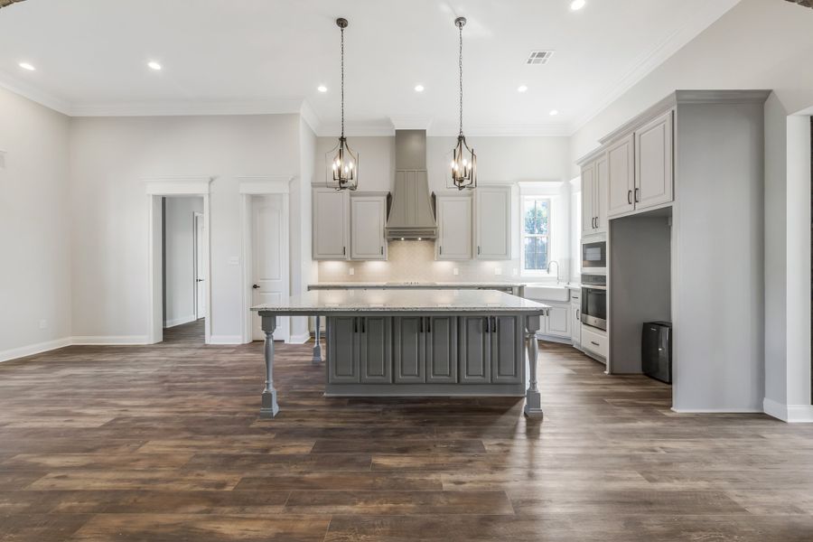 Representative furnished interior of a home built from the The Lafitte by Manuel Builders in Chapel Bend, Montgomery (Image 8).