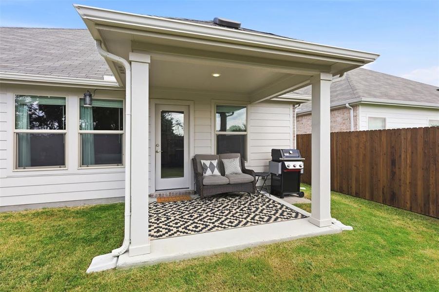 Exterior details and patio area of a home in Tesoro at Chisholm Trail Ranch, Crowley (Image 4).