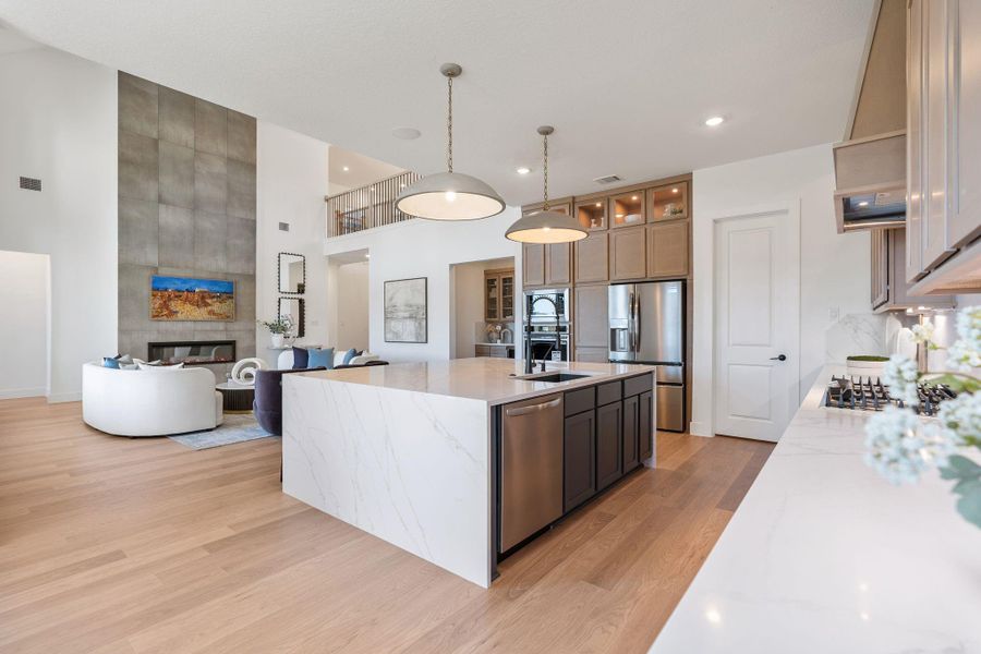 Chef-caliber kitchen serves as the focal point of the open-concept living area Chef-caliber kitchen serves as the focal point of the open-concept living area