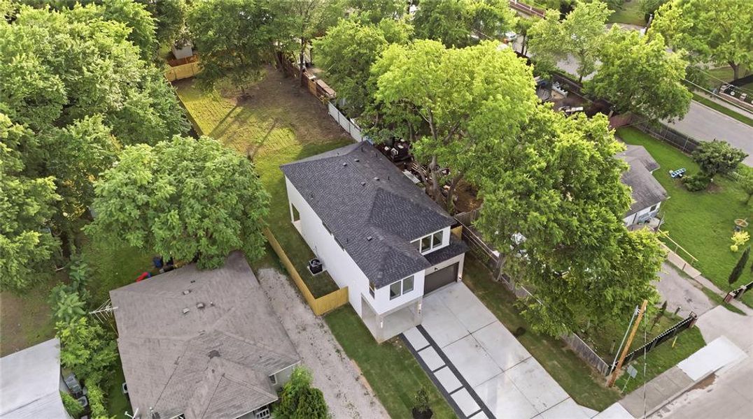 Front exterior of a new home in , Dallas, TX, highlighting curb appeal (Image 22).