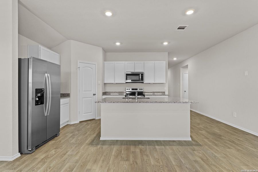 Furnished interior view inside a new home in Swenson Heights, Seguin (Image 4).