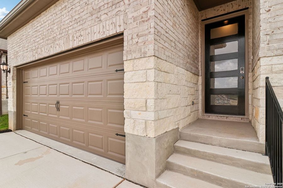 Front exterior of a new home in , Cibolo, TX, highlighting curb appeal (Image 17). Front exterior of a new home in , Cibolo, TX, highlighting curb appeal (Image 17).