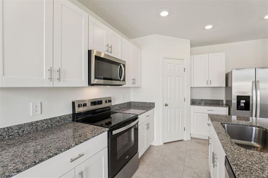 Furnished interior view inside a new home in Lawson Dunes - Signature Series, Haines City (Image 9).