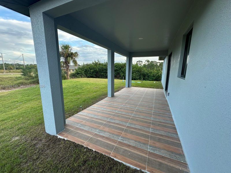 Exterior details and patio area of a home in , Lehigh Acres (Image 2). Exterior details and patio area of a home in , Lehigh Acres (Image 2).