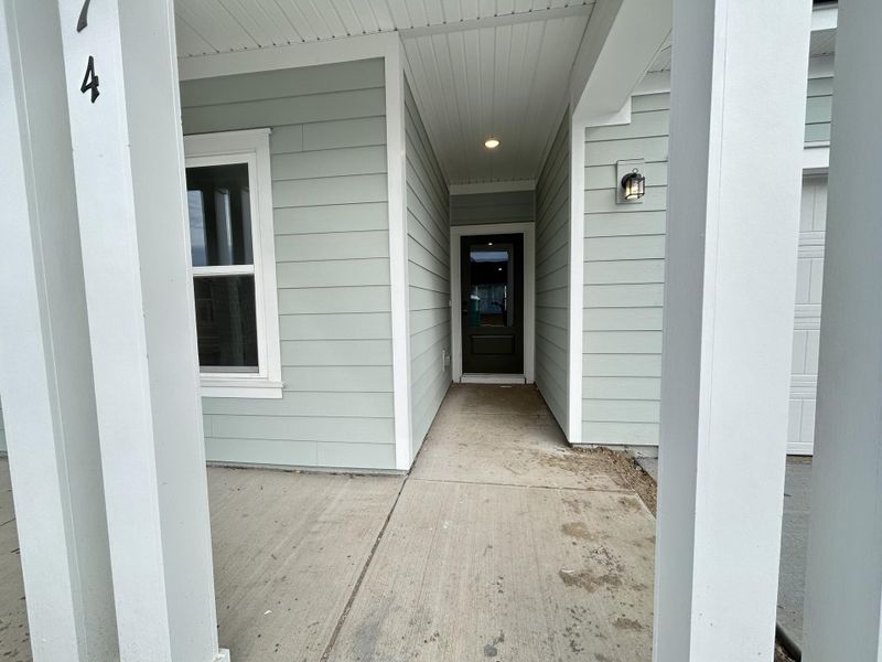 Exterior details and patio area of a home in Tea Farm, Ravenel (Image 3). Exterior details and patio area of a home in Tea Farm, Ravenel (Image 3).