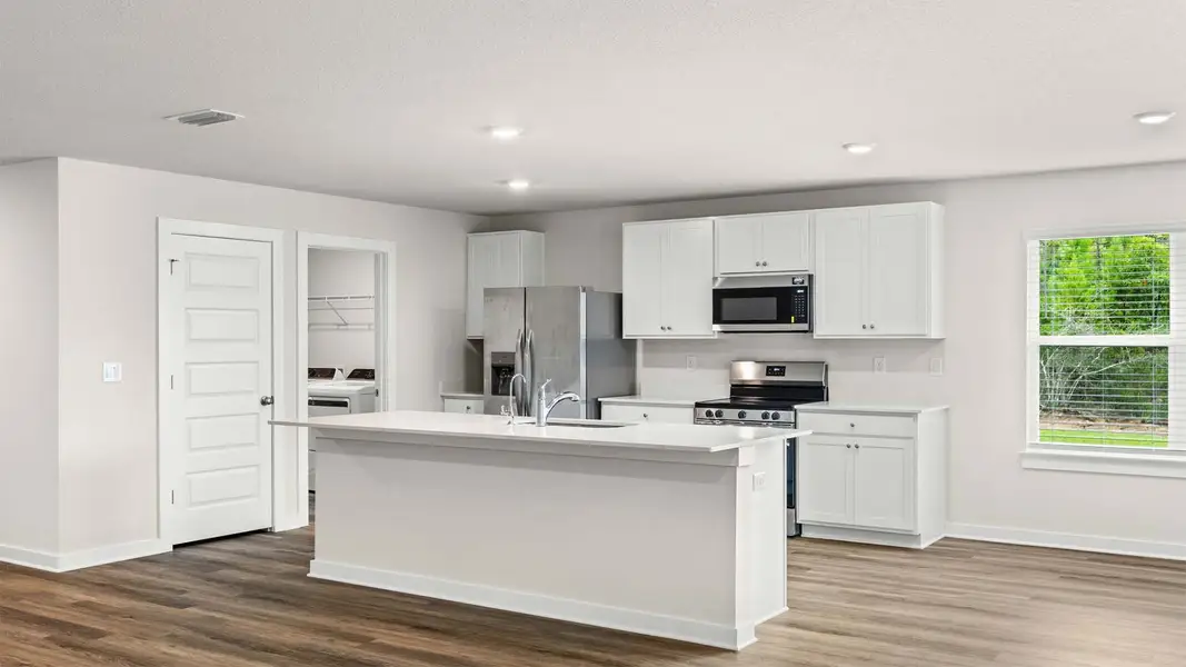 Furnished interior view inside a new home in Sunny Hills, Chipley (Image 3).