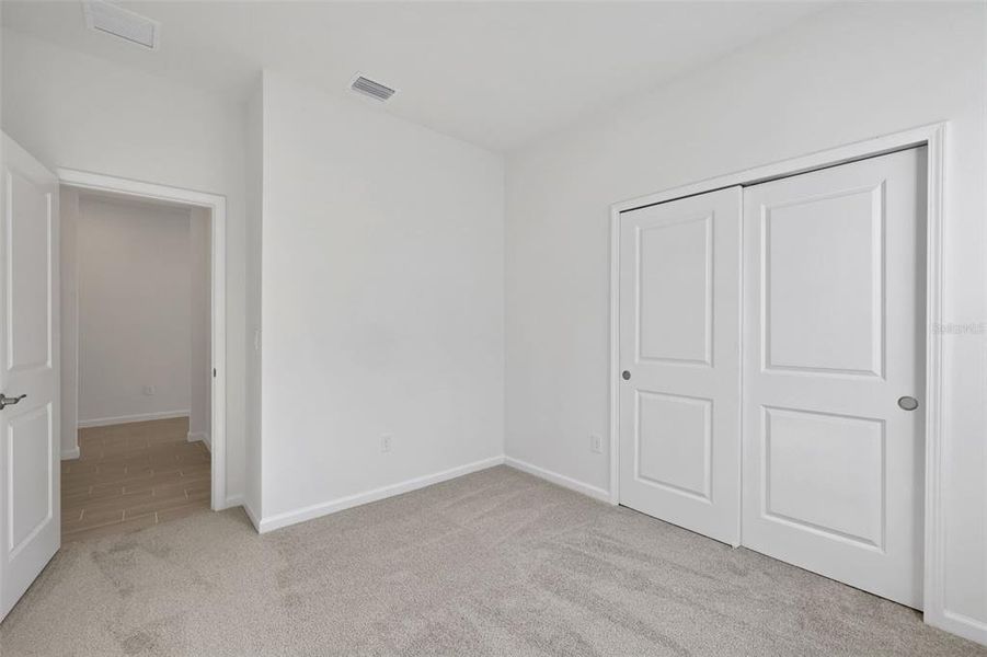 Spacious, unfurnished interior of a new home in Brystol North at Wylder, Port St. Lucie (Image 29).