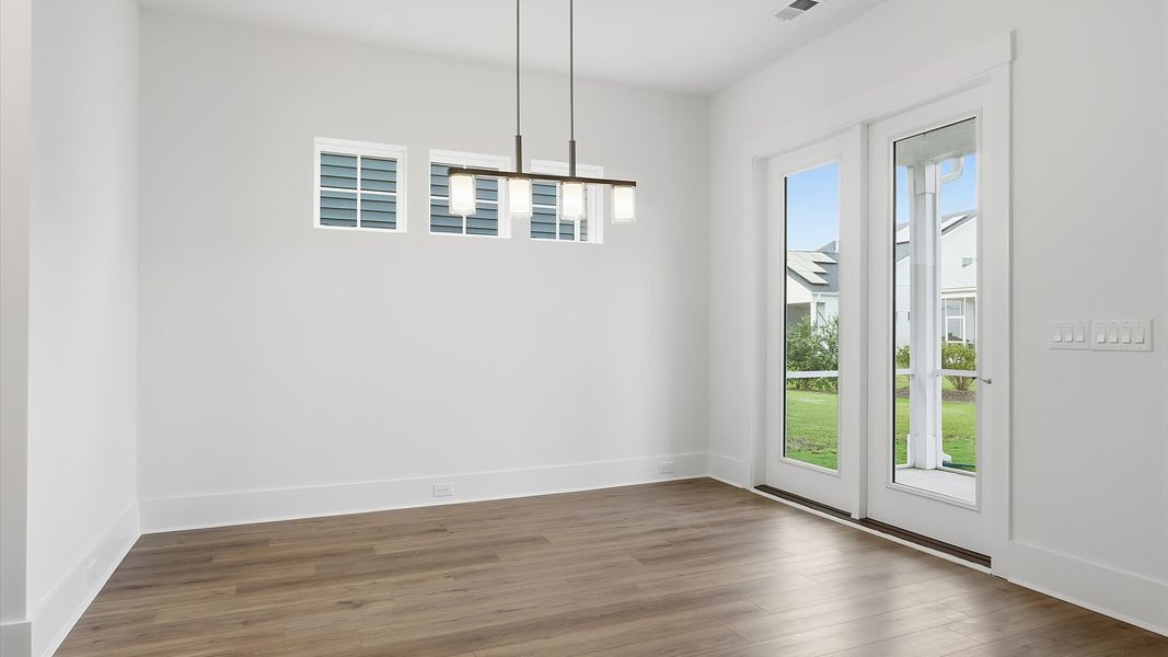 Representative furnished interior of a home built from the Eden by DRB Elevate. in Summerwind Crossing at Lakes of Cane Bay, Summerville (Image 9).