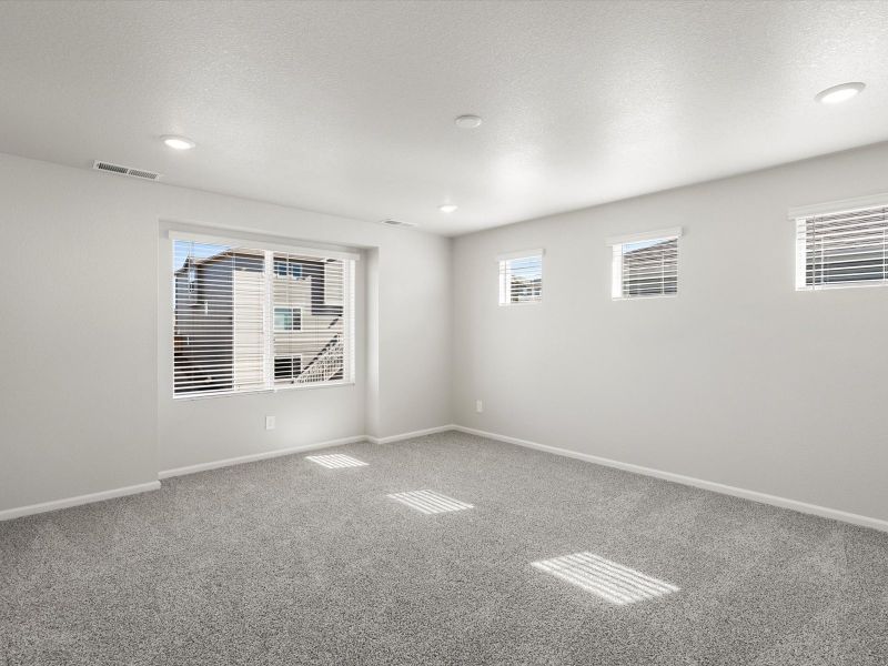 Spacious, unfurnished interior of a new home in Buffalo Highlands: The Flora Collection, Commerce City (Image 12).