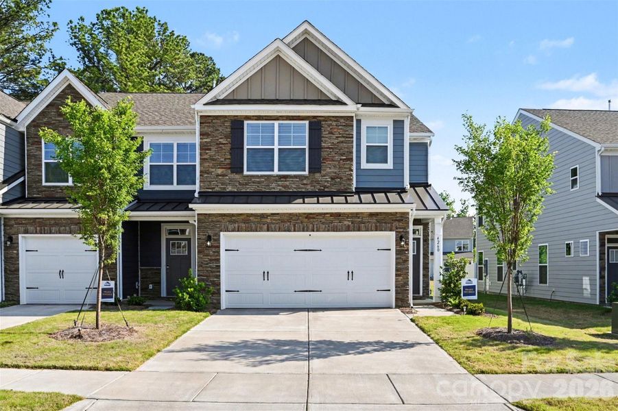 Front exterior of a new home in , Harrisburg, NC, highlighting curb appeal (Image 1). Front exterior of a new home in , Harrisburg, NC, highlighting curb appeal (Image 1).