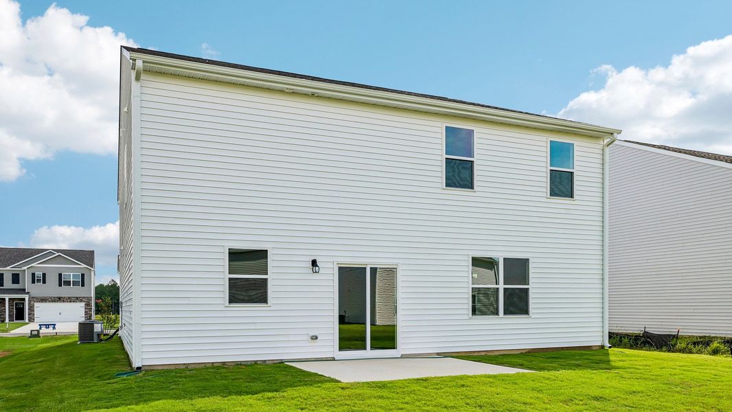 Exterior details and patio area of a home in Shahbain Reserve, Raeford (Image 4).