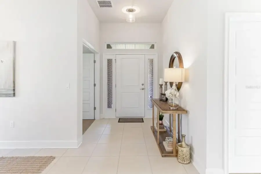 Representative furnished interior of a home built from the 1820 by Adams Homes in Flagler Estates, Hastings (Image 6).