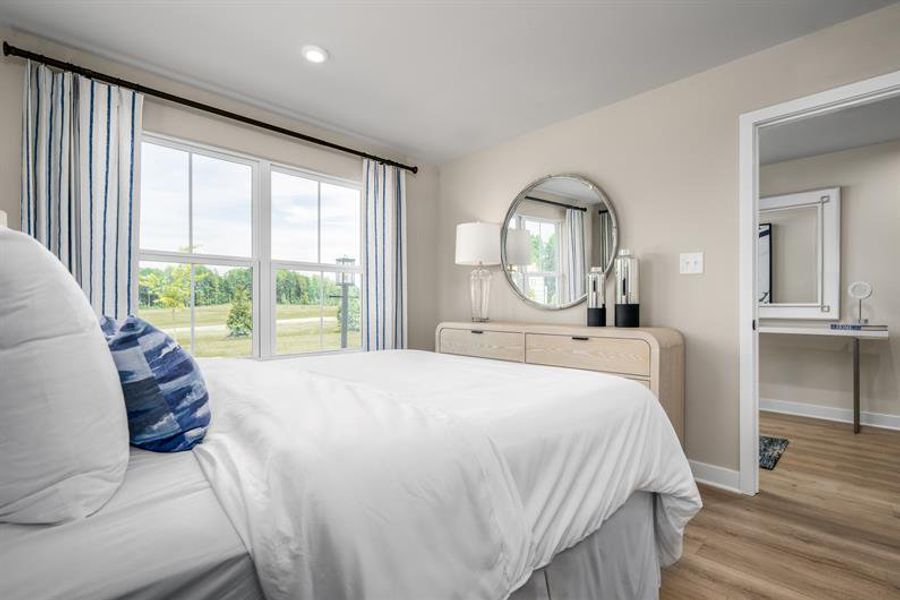 Representative furnished interior of a home built from the Schuman by Ryan Homes in Stowe Branch Townhomes, Charlotte (Image 19).