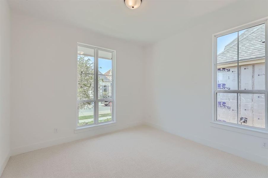 View of carpeted spare room