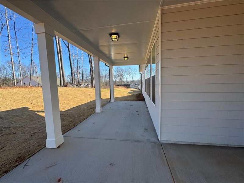 Exterior details and patio area of a home in Rosewood Lake Preserve, Hoschton (Image 3).