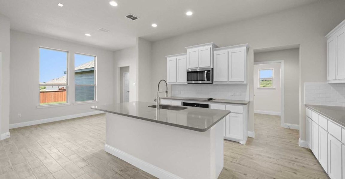 Representative exterior photo of a completed home built from the Alderbury by Impression Homes in Timberbrook, Justin, TX (Image 6).