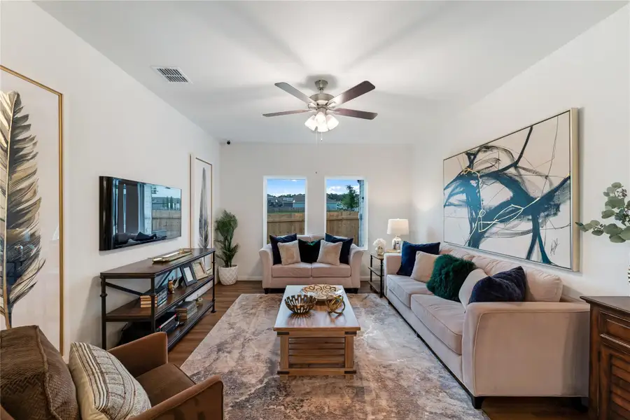 Furnished interior view inside a new home in Sweetgrass Village, Crosby (Image 7).