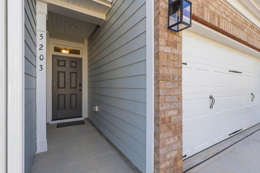 Exterior details and patio area of a home in Harbor Crossing, Greensboro (Image 24).