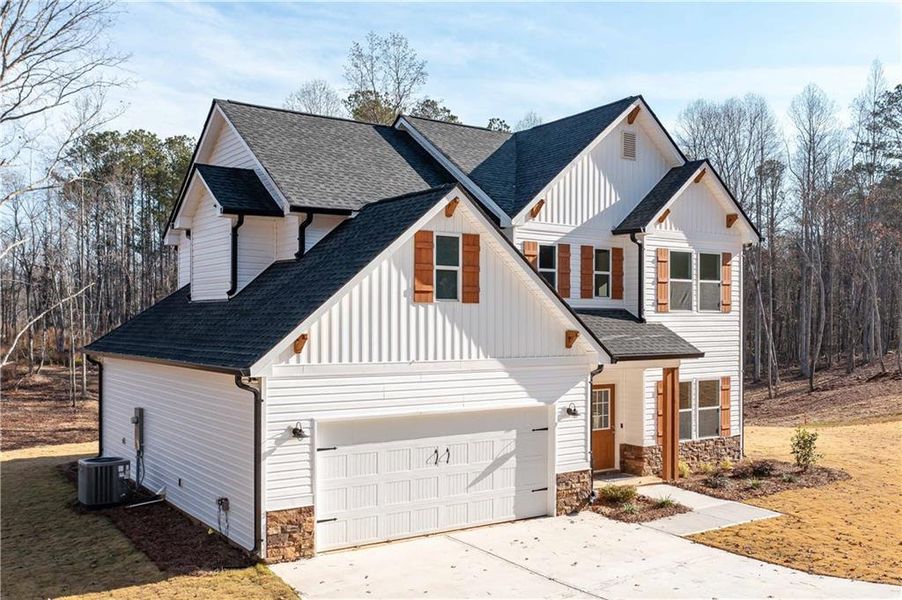 Front exterior of a new home in , Buchanan, GA, highlighting curb appeal (Image 2).