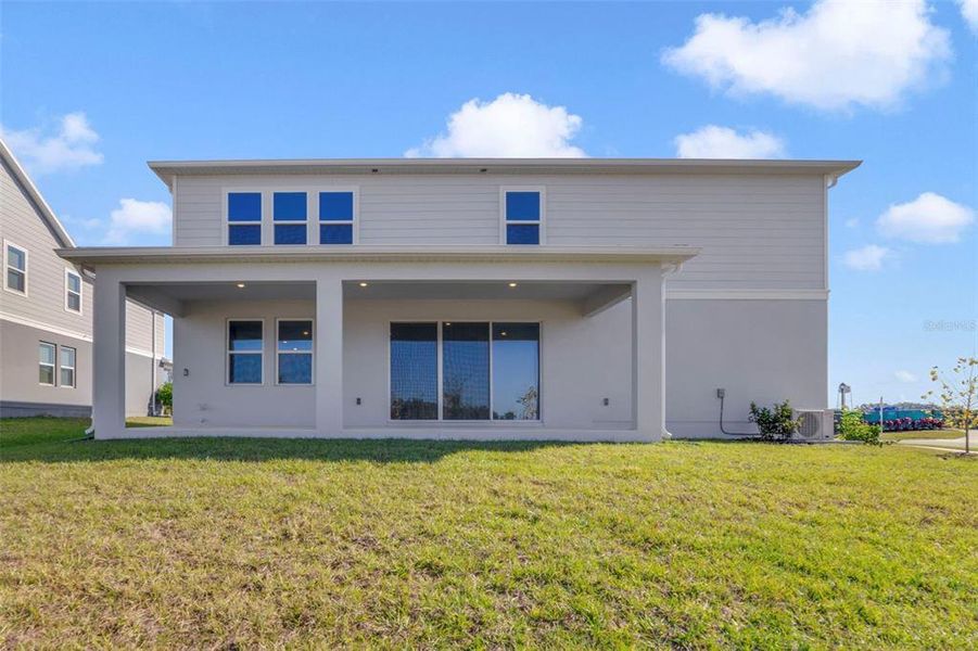 Exterior details and patio area of a home in Vintner Reserve, Clermont (Image 4).